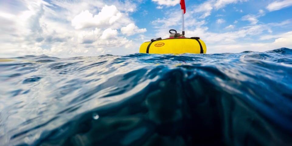 Brownie’s Third Lung A floating tankless dive system on the ocean's surface pumps air to divers below.
