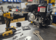 Annual maintenance of a Brownie's dive system engine on a workbench with tools scattered around, showcasing the meticulous care and servicing process.